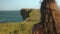 Bokeh woman headshot: tourist relaxing on Wild Beach, Indonesia, Asia. Epic landscape of tropical National Park