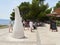 Bol, Croatia - July 25, 2021. Sculpture of the symbol of the Adriatic Sea on the promenade leading to the Zlatni Rat beach