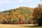 Bold Fall Colors Shown in Field and Mountains