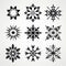 Bold Graphic Design: Black Snowflakes On White Background