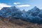 Bold mountains landscape with snow on peaks under the blue sky