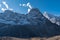 Bold mountains landscape with snow on peaks under the blue sky