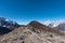 Bold mountains landscape with snow on peaks under the blue sky