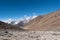 Bold mountains landscape with snow on peaks under the blue sky on an early spring day