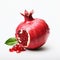 Bold And Vibrant Pomegranate With Water Drops On White Background