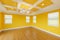 Bold Yellow Custom Master Bedroom Complete with Fresh Paint, Crown and Base Molding, Hard Wood Floors and Coffered