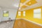 Bold Yellow Before and After of Master Bedroom Showing The Unfinished and Renovation State Complete with Coffered Ceilings and