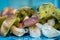 Boletus edulis mushrooms laying on the blue background