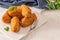 Bolinhos de bacalhau, very famous in Portuguese gastronomy. Fried dumpling, cod dumpling, fish meat, salted cod fritters, bacalao