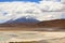 Bolivian Andes highlands. Calm waters lake in the flat desert.