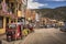 Bolivian city called Cotagaita, with taxi-motorbikes in the street and constructions over the road. Southern Bolivia.