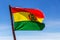 Bolivian Flag waving in the wind against blue sky background