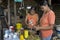 Bolivian girl and young woman cooking in kitchen