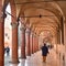 Bologna, Italy - 16 Nov, 2022: Traditional Porticos, covered arcades, on the streets of Bologna