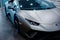 Bologna, Italy - December 9, 2019: Original Lamborghini Huracan Performante. Logo and front grill, headlights. Luxury stylish car.