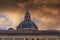 Bologna, Italy Santa Maria della Vita Catholic church dome against dramatic orange clouds