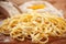 Bologna original Homemade tagliatelle pasta on a cutting board