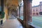 Bologna - The porticoes of Saint Stephen square or Piazza San Stefano in morning