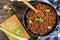 Bolognese ragout in skillet, top view