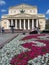 Bolshoi theater in Moscow. The square is decorated by flowers.