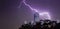 A Bolt of Lightning Over an Observatory