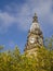 Bolton Town Hall above leafy trees