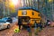 Bolu, Turkey - November 11 2021: back view camper with orange color caravan in a forest