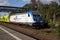 A Bombardier Class 187 locomotive is waiting with a freight train for departure at Marburg station.