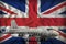 Bomber with city camouflage on the United Kingdom UK state flag background. 3d Illustration