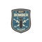 Bomber division patch on uniform with bombs, sword