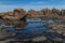 Bombo Headland Quarry Australia. Blue skies and reflections in water