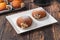 Bombolone or bomboloni is an Italian filled donut and snack food. German donuts - krapfen or berliner - filled with jam and