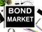 Bond Market - text on chalkboard with office tools