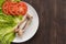 Bone chicken and vegetable on wooden background.