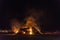 Bonfire on a beach at night, Costa Brava, Spain