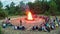 Bonfire in Children`s Summer Camp in Nature in the Forest at Evening. Timelapse