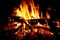 Bonfire close-up near a tourist tent, burning firewood. Orange flame of fire cooking at the stake. Arson or natural disaster