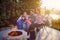 Bonfire Delights: A Family\'s Marshmallow Roasting Celebration with Patriotic Pride