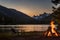 Bonfire at lakeside campground at night.