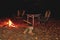 Bonfire night glade camping furniture, tourist camp, firewood and ax