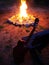 Bonfire in the night, outdoor camping in summer with guitar