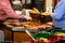 Bonn Germany 17.12.2017 imbiss selling food meat and sausages Traditional Christmas market by night