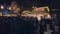 Bonn Germany, 23 Dec 2019: Blurred crowds at Christmas fair walking amid ferris wheel