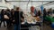 Bonn, Germany, 23 of October 2017: People Choose Plates on Flea Market In The Center Of Bonn.