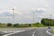 Bonn, Germany May 23, 2019. A windmill for electricity production standing in a field along the highway in West Germany.