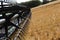 BONNYVILLE, ALBERTA, CANADA - SEPTEMBER 12, 2020: Closeup view of John Deere tines on a combine parked during harvest