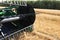 BONNYVILLE, ALBERTA, CANADA - SEPTEMBER 12, 2020: Closeup view of John Deere tines on a combine parked during harvest