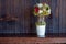 Bonsai vase on a shelf wooden shelf Flowers in interior