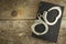 Book and handcuffs on a wooden table. The concept of punishment and justice. Punishment for a crime. Corruption and punishment.