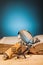 Book magnifying glass and glasses on wooden table